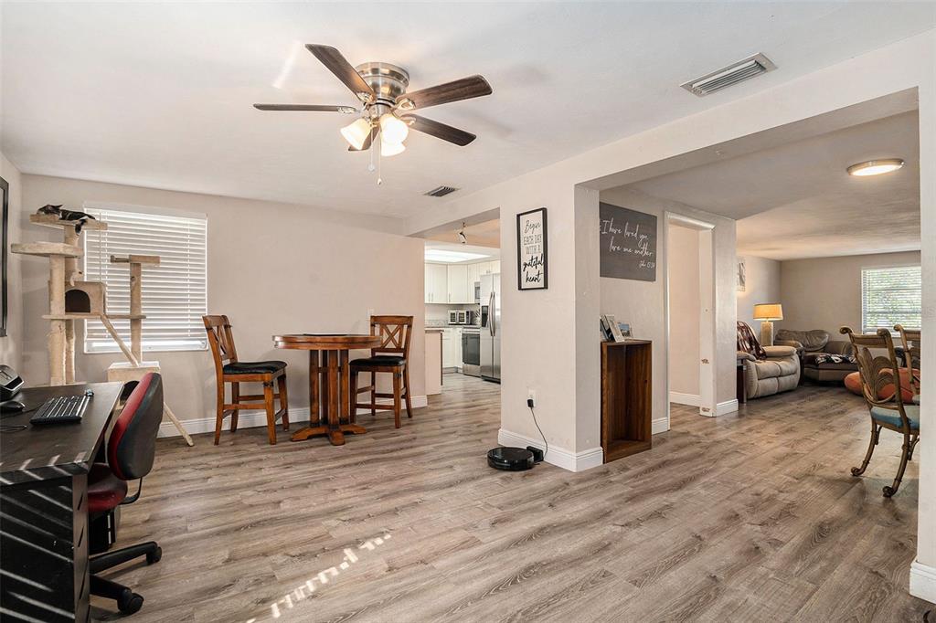 6406 Pawling Avenue Port Richey, FL 34668 - Photo 13 of 28 a living room with furniture and a wooden floor