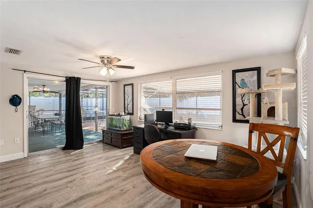 a room with furniture and wooden floor