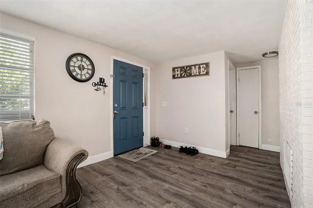 a bedroom with a bed and a table in it