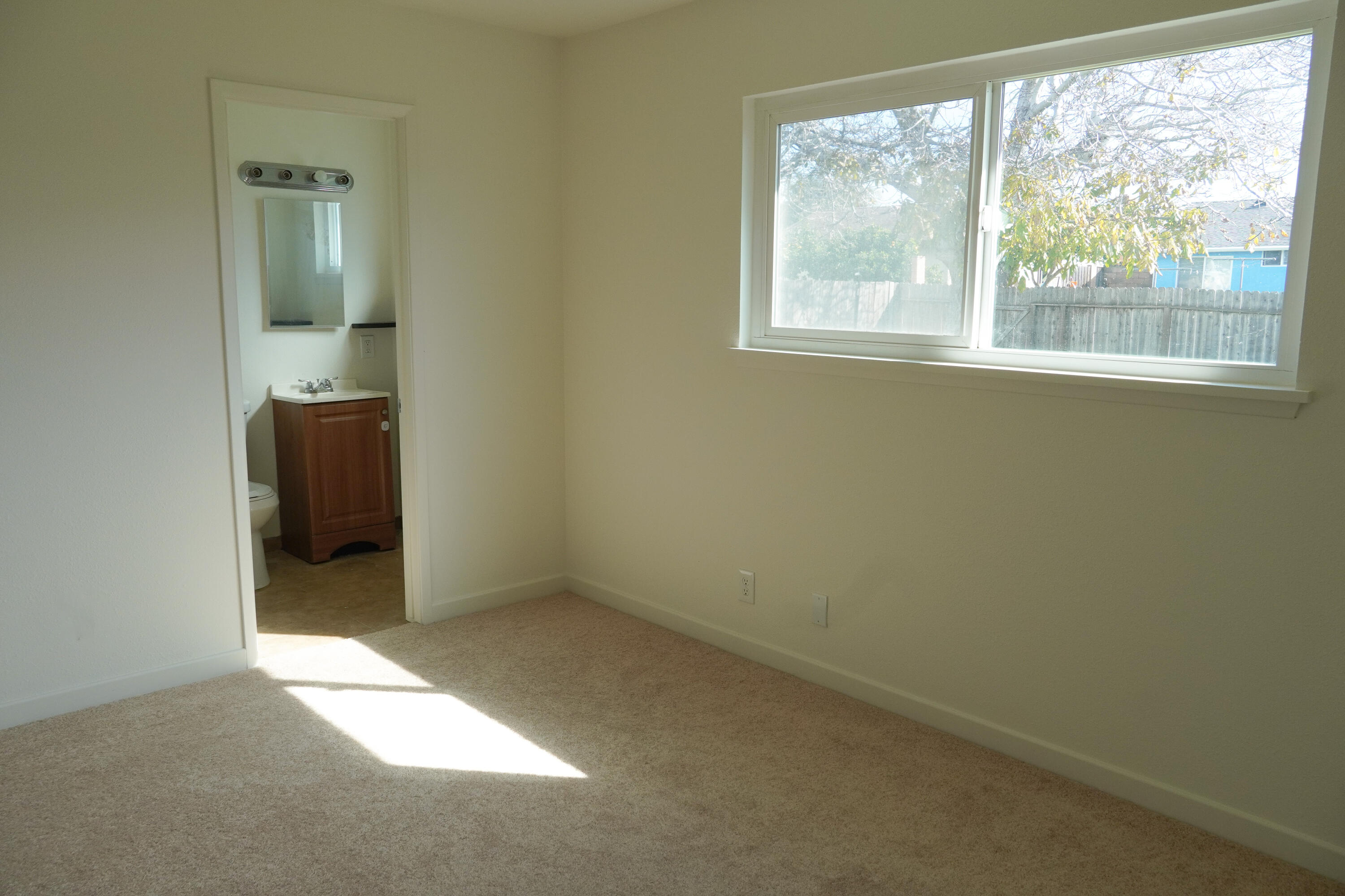 1100 North Third Street Lompoc, CA 93436 - Photo 9 of 12 an empty room and a window