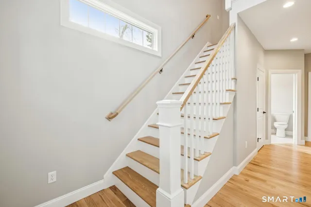 a view of entryway with wooden floor