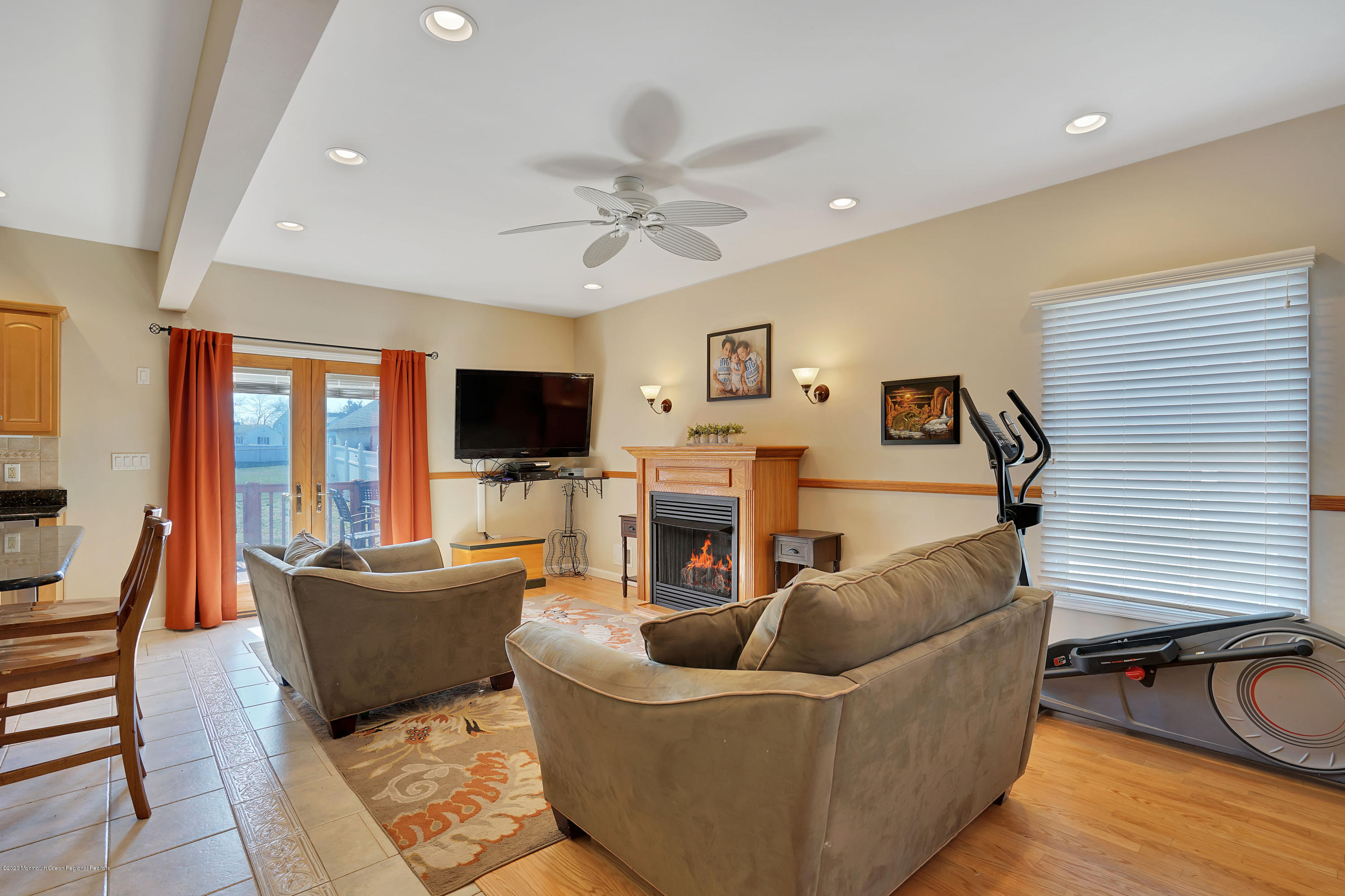 115 Harding Road Red Bank, NJ 07701 - Photo 23 of 43 a living room with furniture and a flat screen tv