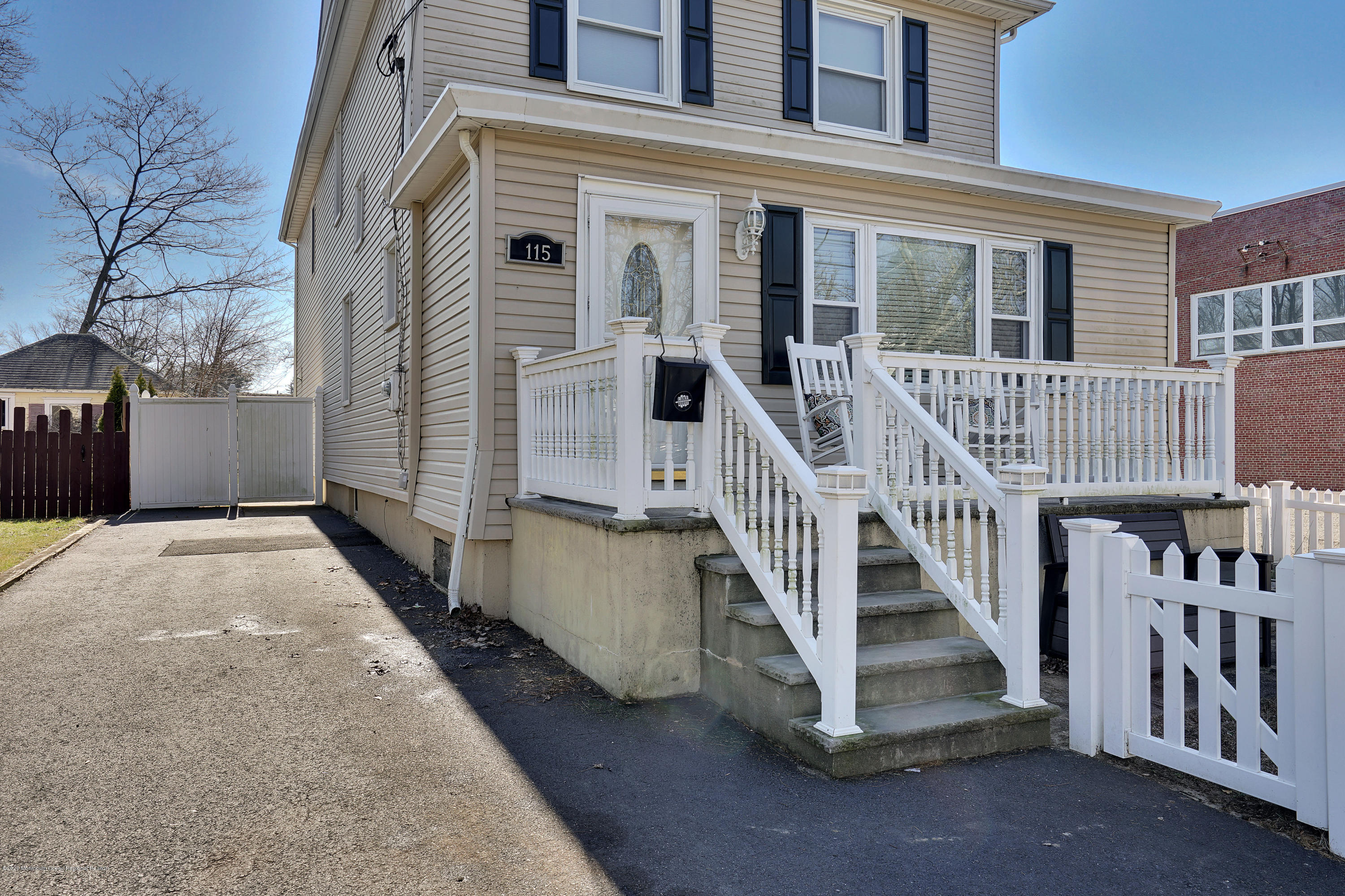 115 Harding Road Red Bank, NJ 07701 - Photo 5 of 43 a view of a house with deck and a yard