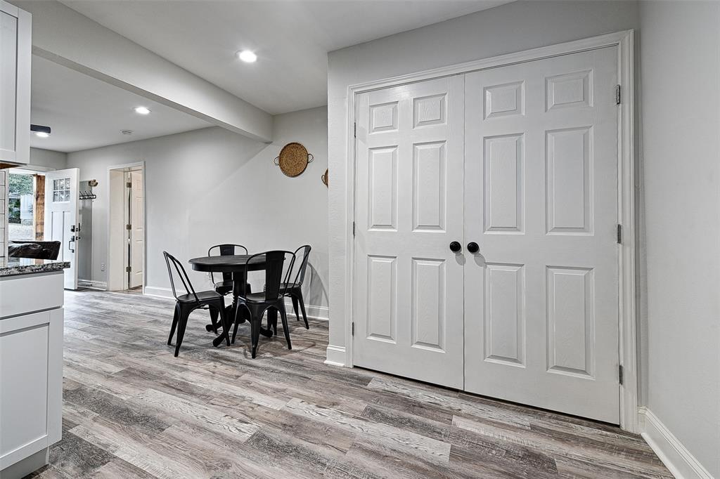 1201 Ridgewood Road Denison, TX 75020 - Photo 10 of 29 Dining room featuring light wood-type flooring and beamed ceiling