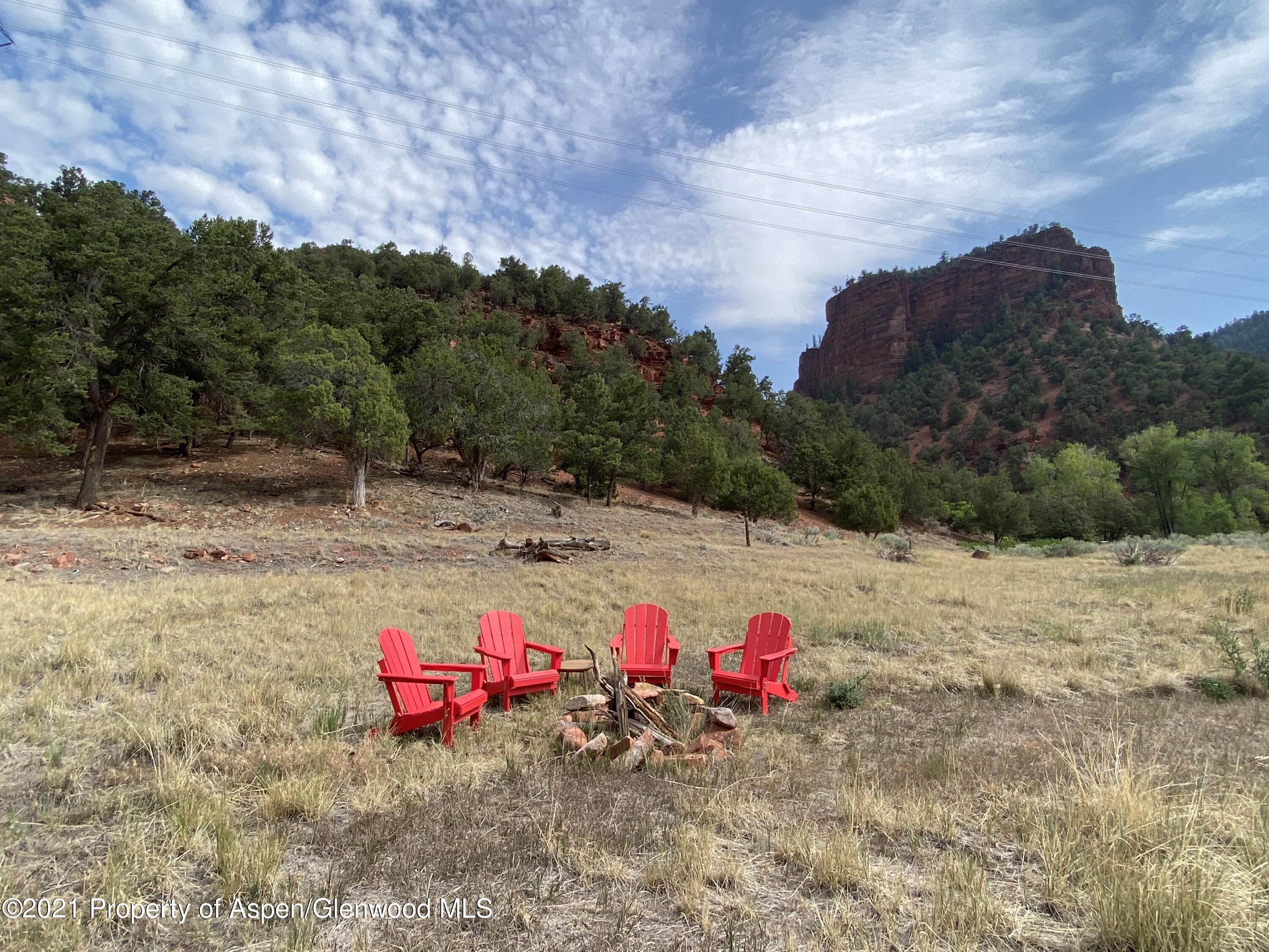 1200 Frying Pan Road Basalt, CO 81621 - Photo 3 of 29 a view of swimming pool with a yard and trees