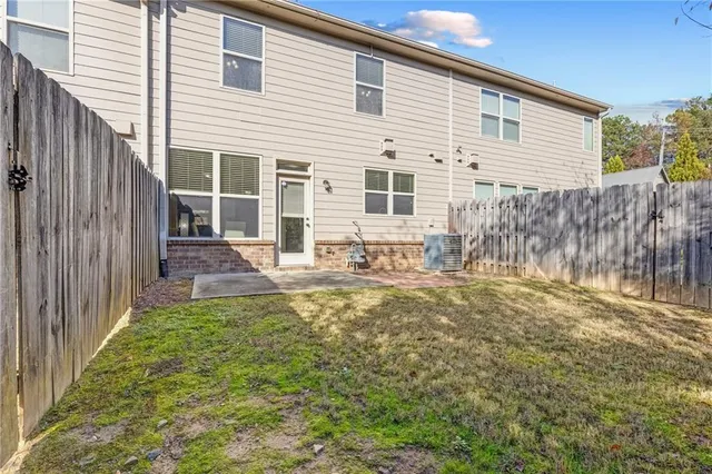 an aerial view of residential house with outdoor space