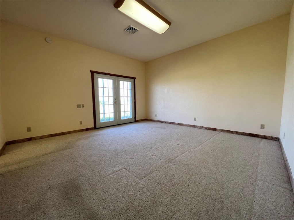 333 County Road 497 Taylor, TX 76574 - Photo 15 of 23 Bedroom two with on suite bathroom