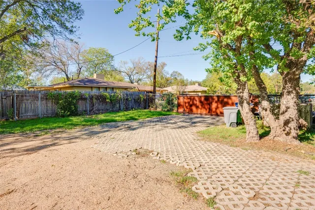 a view of a hallway with washer and dryer