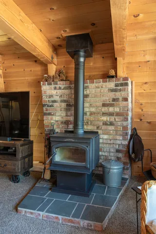 a brick building with a bench in front of it