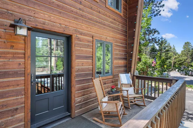 a view of balcony with furniture