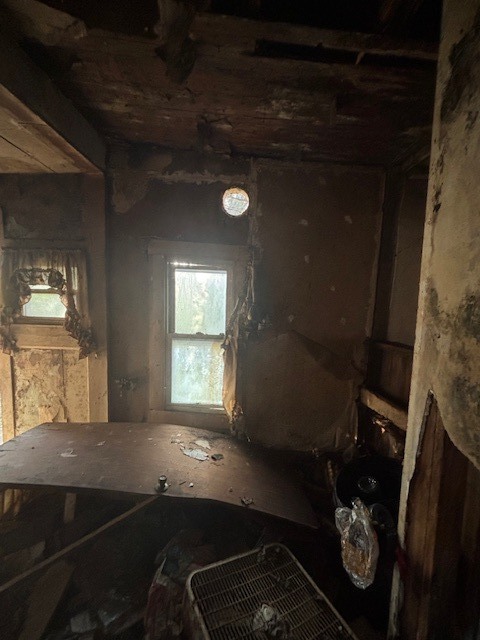 4872 Old North Road Christopher, IL 62822 - Photo 15 of 16 a room with water heater and wooden door