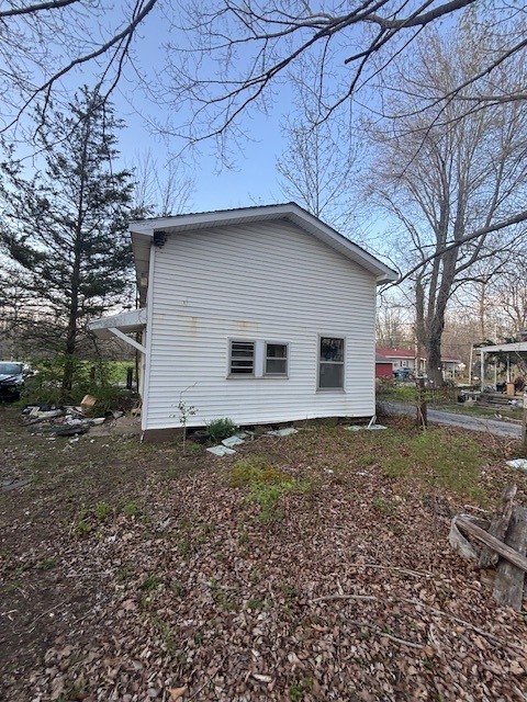 4872 Old North Road Christopher, IL 62822 - Photo 3 of 16 a house is sitting in middle of the forest