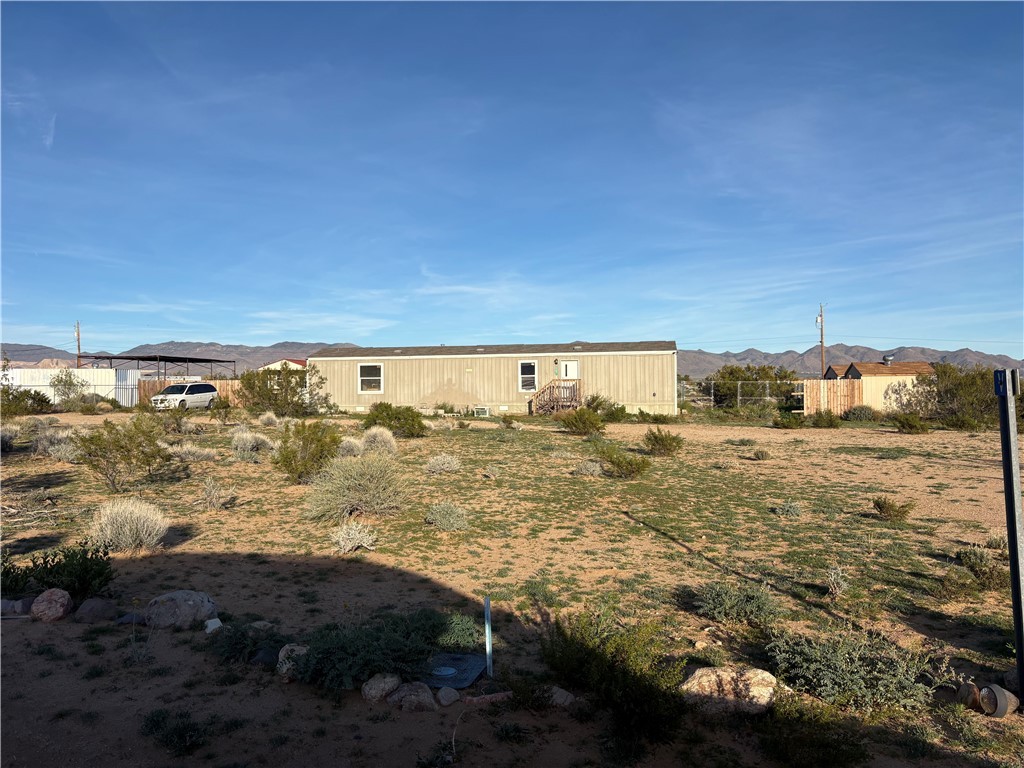 4938 Mormon Flat Road Golden Valley, AZ 86413 - Photo 15 of 23 Back of property