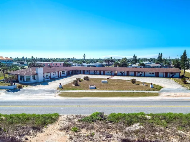 a view of a swimming pool and an outdoor space