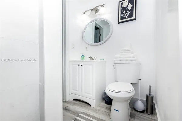 a bathroom with a toilet and a sink