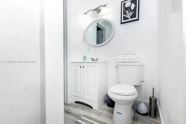 a bathroom with a toilet and a sink