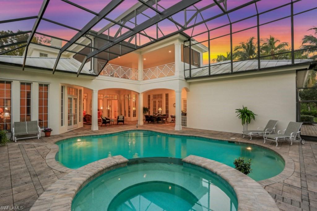 a view of a swimming pool with a patio