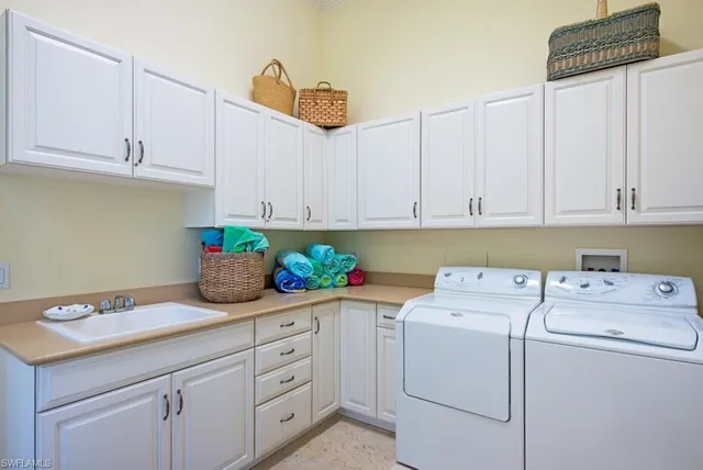 a bed room with a bed and a lamp