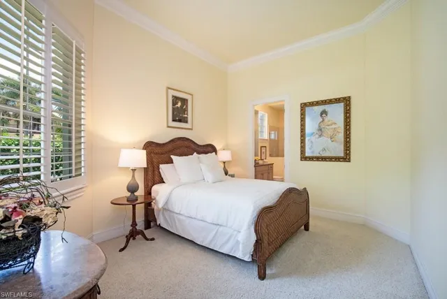 a bathroom with a sink and mirror with toilet