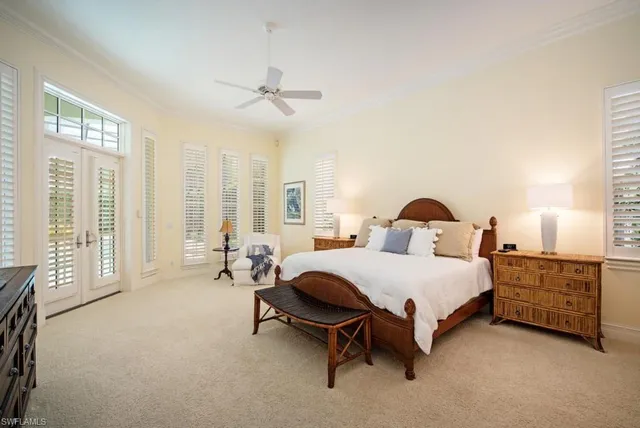 a spacious bathroom with sinks mirror and a bathtub