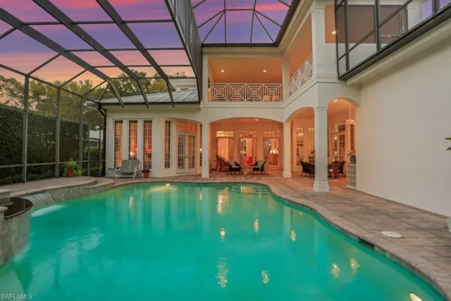 a view of a swimming pool with a patio