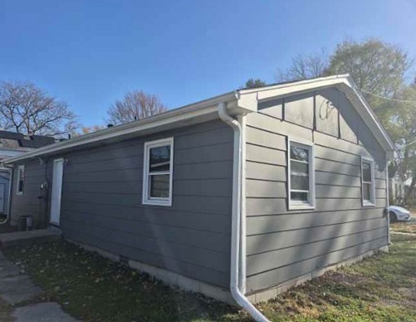 225 Ogden Street Capron, IL 61012 - Photo 4 of 16 a backyard of a house