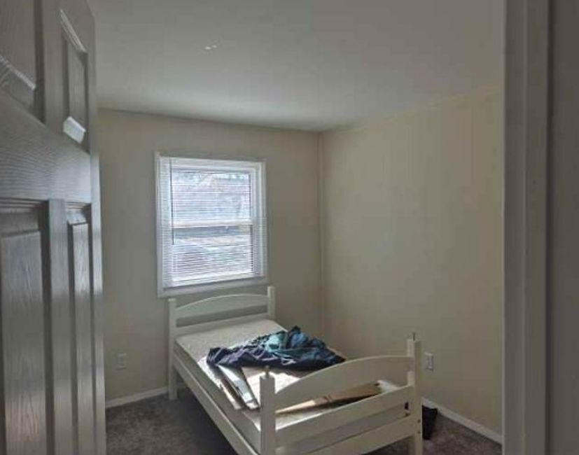 225 Ogden Street Capron, IL 61012 - Photo 10 of 16 a room with storage and utility