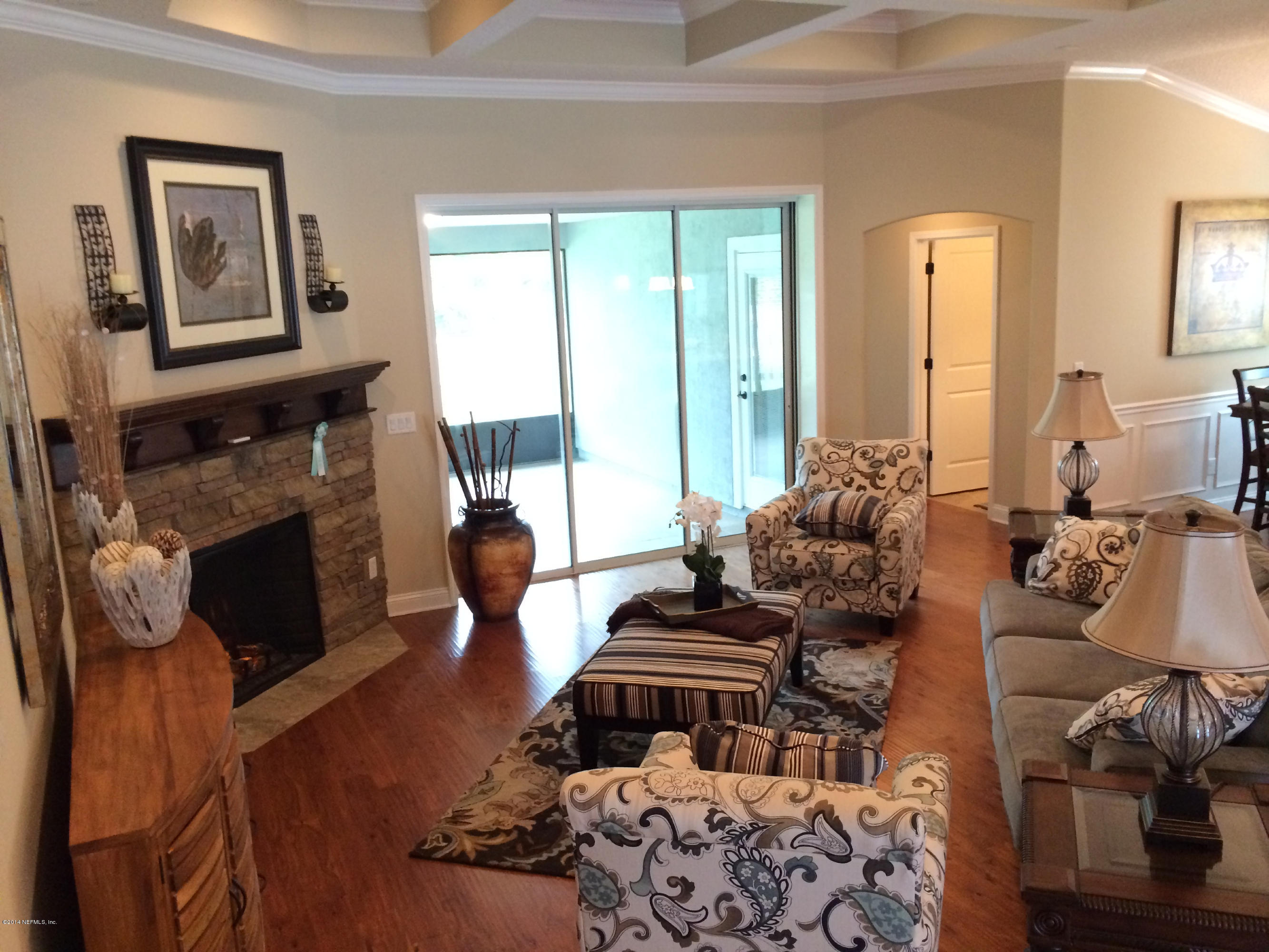 3152 Creighton Landing Road Fleming Island, FL 32003 - Photo 20 of 47 family room with stone fireplace