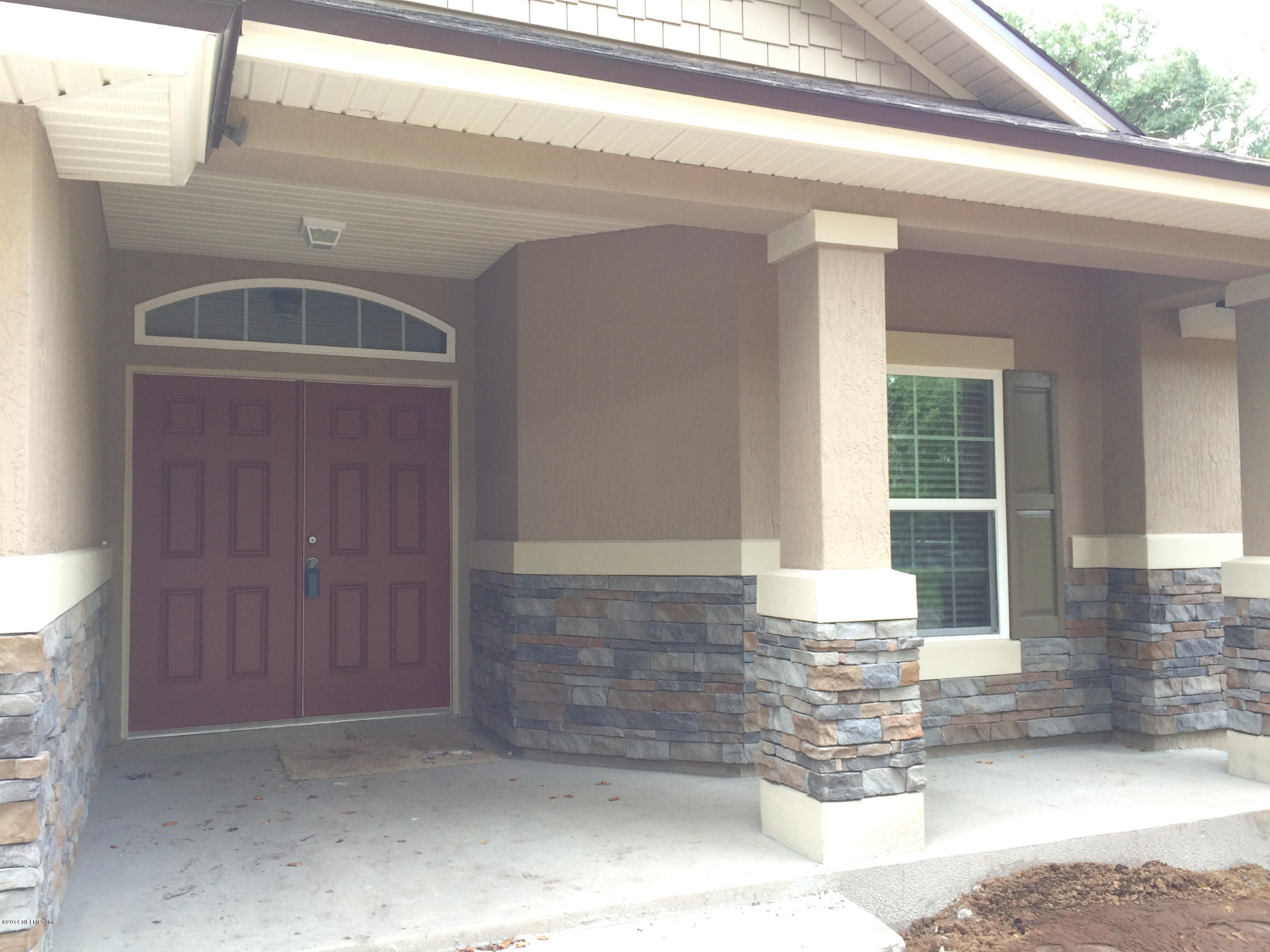 3152 Creighton Landing Road Fleming Island, FL 32003 - Photo 4 of 47 stone accent and double entry doors