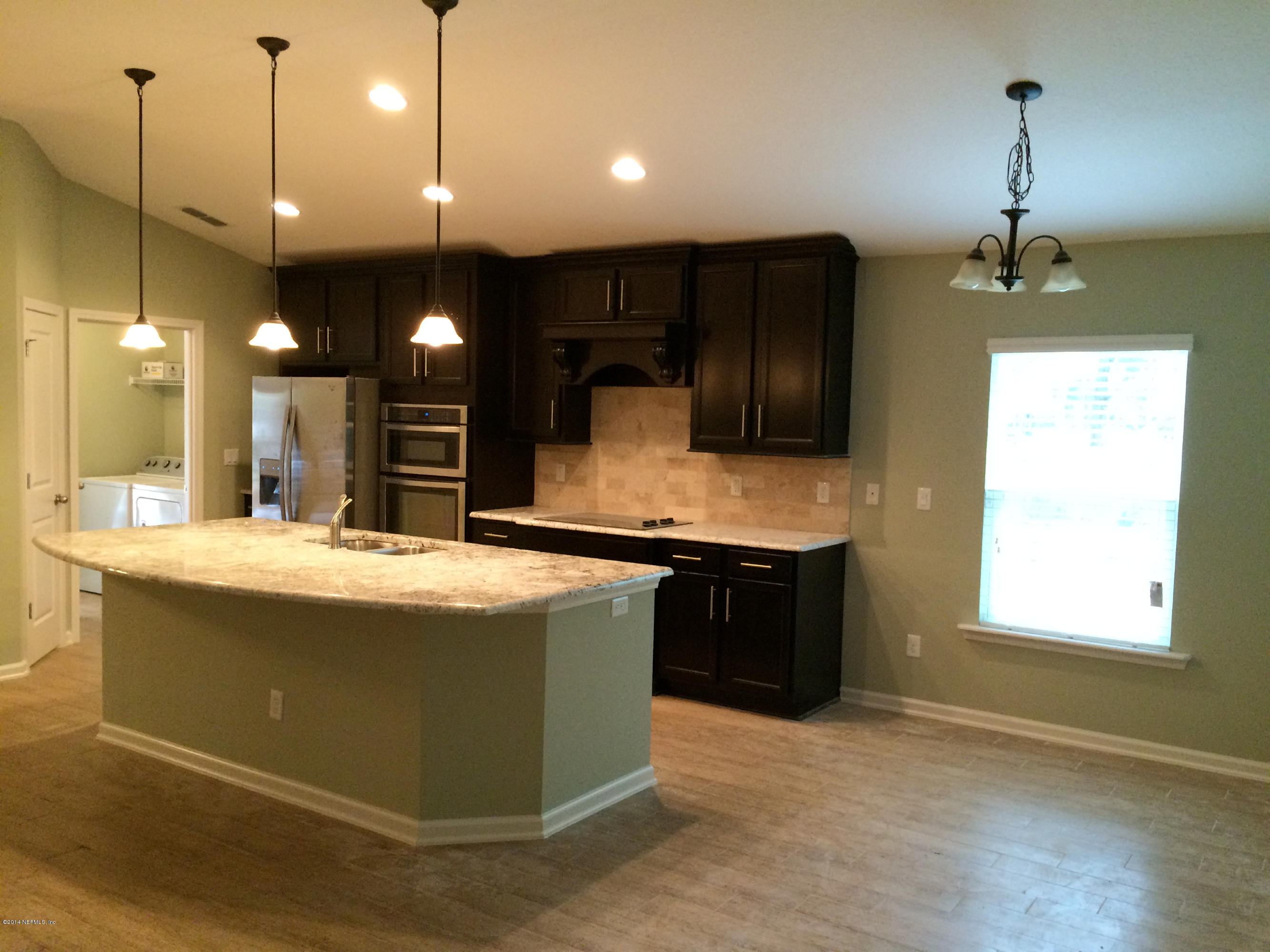 3152 Creighton Landing Road Fleming Island, FL 32003 - Photo 9 of 47 kitchen with large breakfast bar