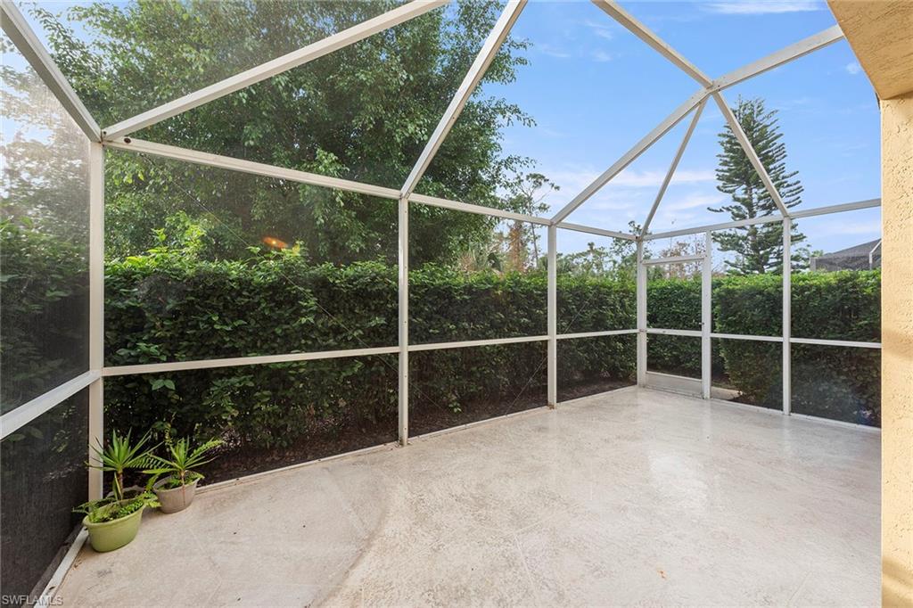 21695 Brixham Run Loop Estero, FL 33928 - Photo 24 of 32 a view of outdoor space with deck and mountain view