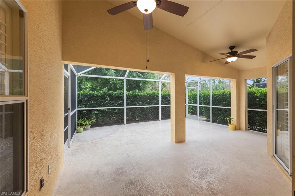 21695 Brixham Run Loop Estero, FL 33928 - Photo 27 of 32 a view of an empty room with a ceiling fan