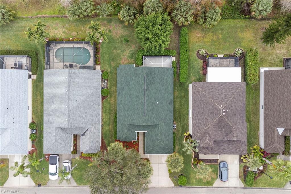 21695 Brixham Run Loop Estero, FL 33928 - Photo 29 of 32 aerial view of a house with a garden