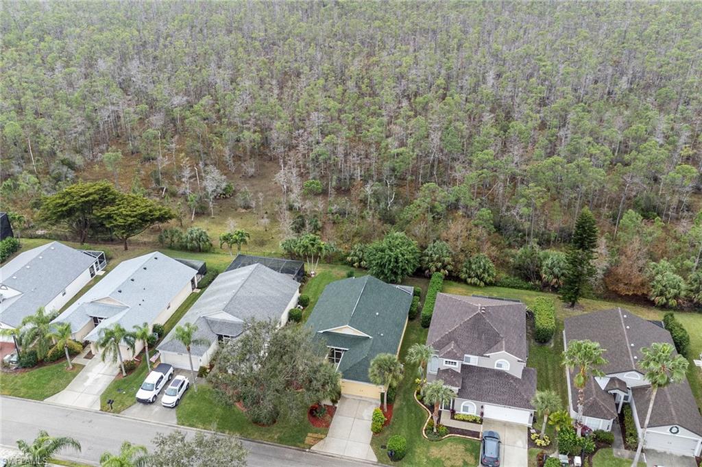 21695 Brixham Run Loop Estero, FL 33928 - Photo 31 of 32 an aerial view of a house with a yard
