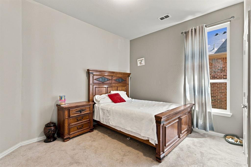 3908 Ranchman Boulevard Denton, TX 76210 - Photo 17 of 29 4th bedroom. Carpet flooring and light neutral wall colors