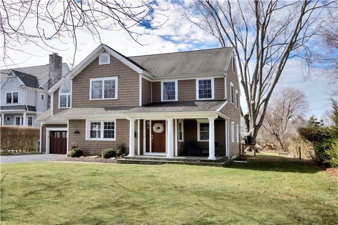 344 Penfield Road Fairfield, CT 06824 - Photo 1 of 1 a front view of a house with a garden
