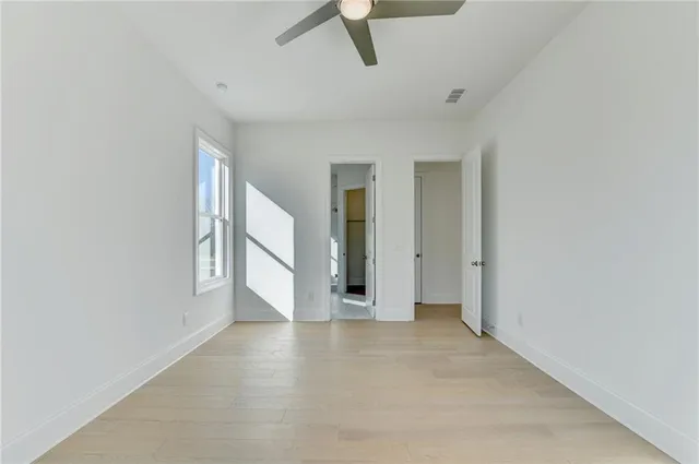 a front view of a house with large windows