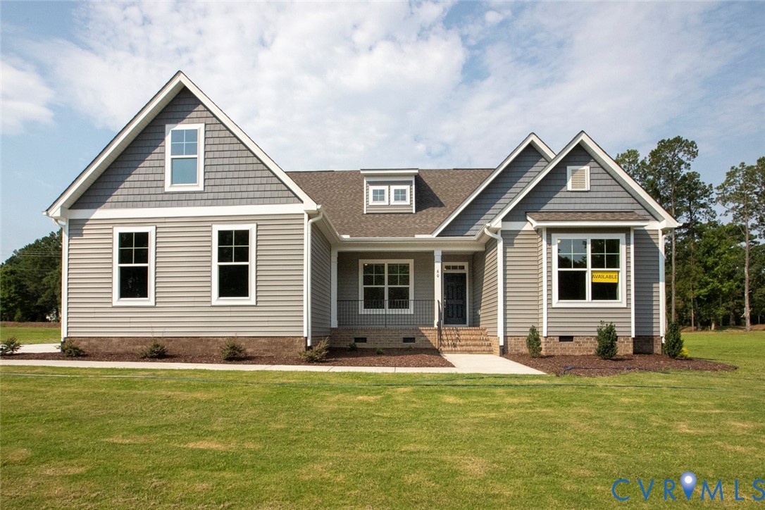 3186 Three Chopt Road Gum Spring, VA 23065 - Photo 1 of 11 a front view of house with yard outdoor seating and barbeque oven