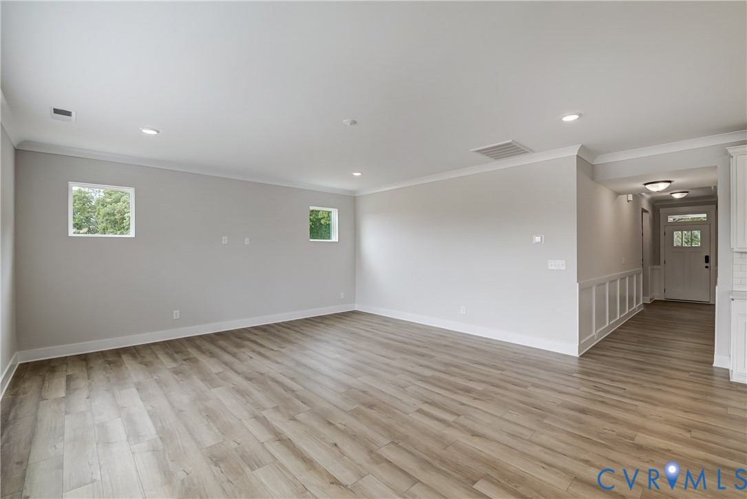 3186 Three Chopt Road Gum Spring, VA 23065 - Photo 4 of 11 a view of an empty room with wooden floor