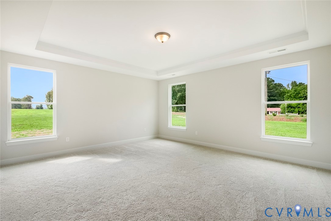 3186 Three Chopt Road Gum Spring, VA 23065 - Photo 5 of 11 an empty room with windows