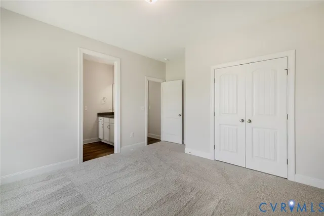 a view of a room with a hallway