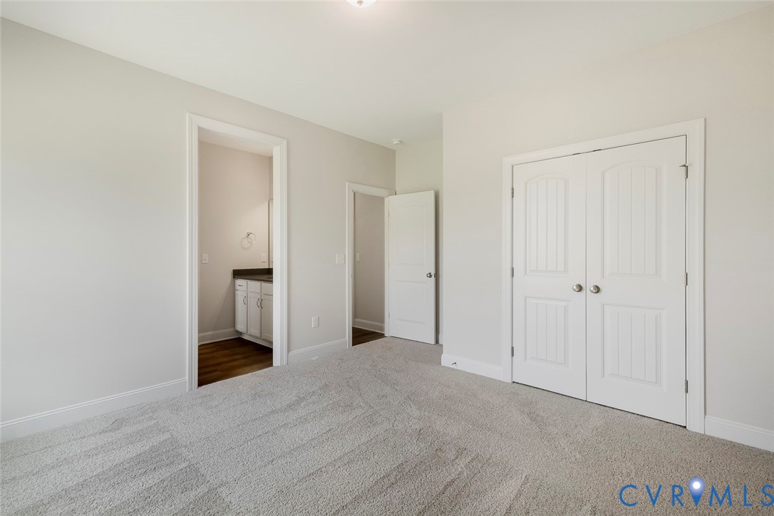 3186 Three Chopt Road Gum Spring, VA 23065 - Photo 10 of 11 a view of a room with a hallway