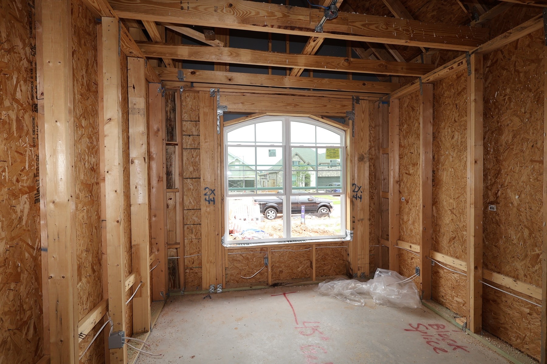 2834 Gdn Mdw Street Fulshear, TX 77423 - Photo 4 of 17 a view of empty room with wooden floor and fan