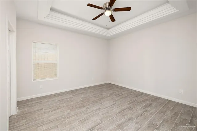 a view of a hallway with white walls