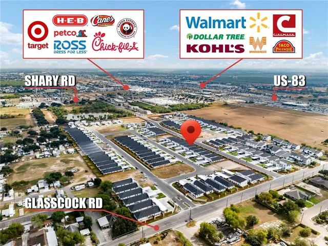 a kitchen with a stove a sink and a refrigerator