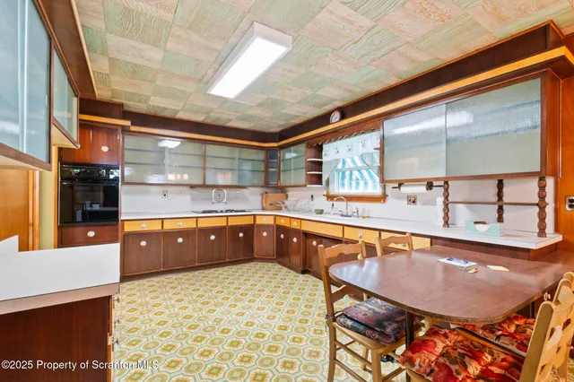 a view of an entryway with a chandelier