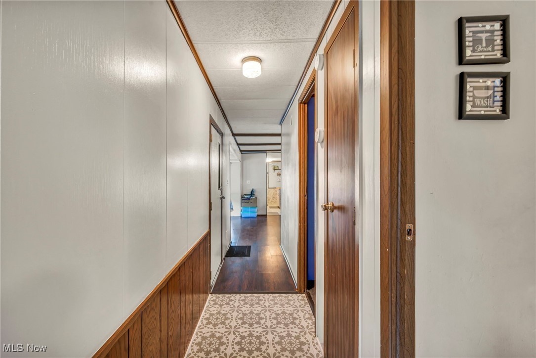35157 Center Ridge Road, Unit 126 North Ridgeville, OH 44039 - Photo 18 of 50 Corridor featuring wood walls