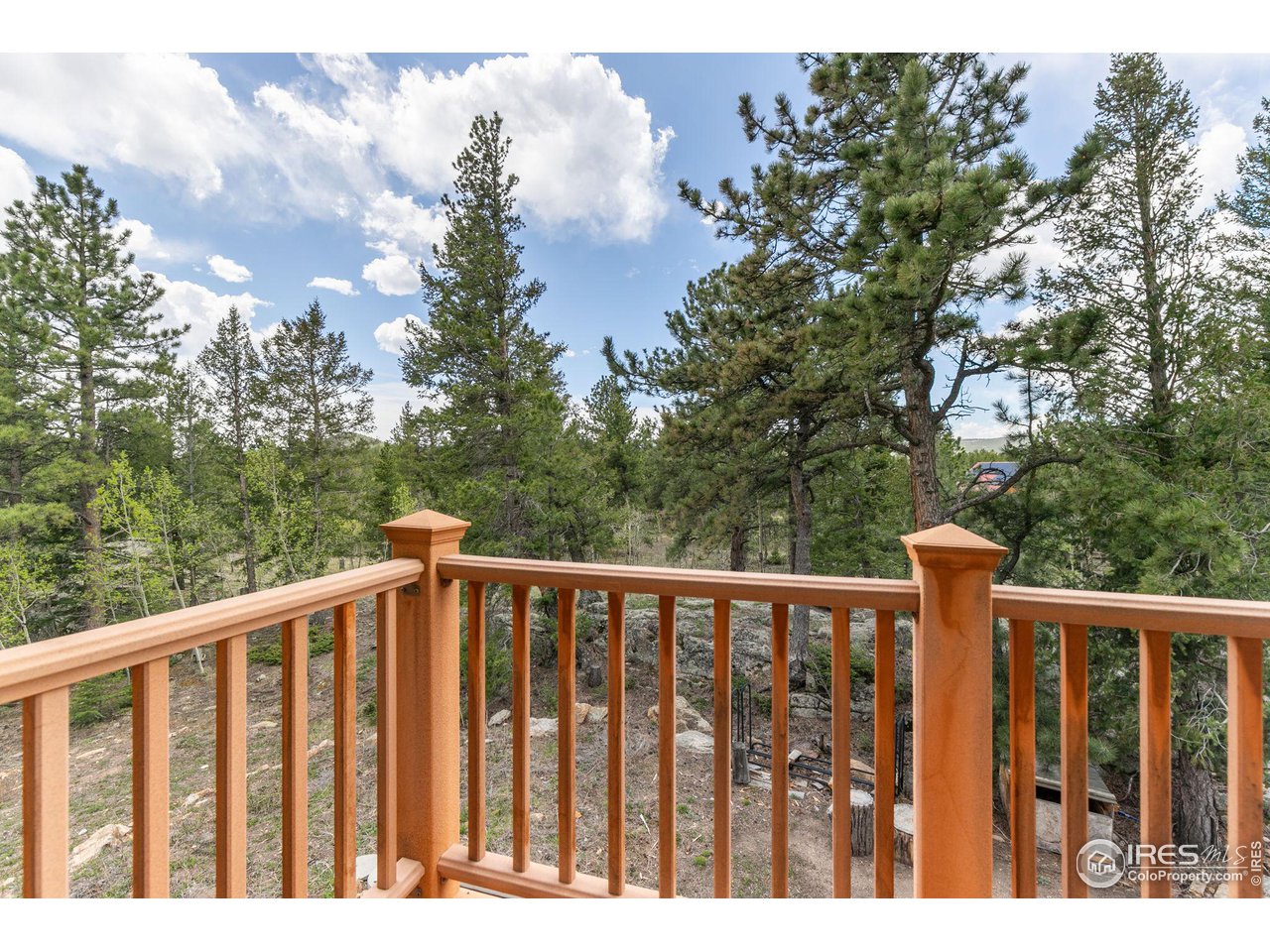 308 Pinon Circle Black Hawk, CO 80422 - Photo 18 of 37 a view of a wooden fence