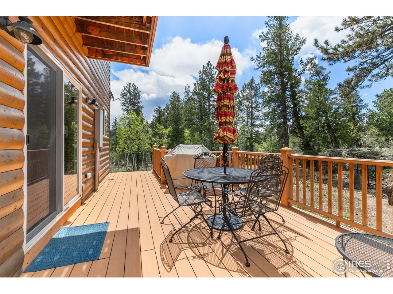 308 Pinon Circle Black Hawk, CO 80422 - Photo 21 of 37 a view of a chairs and table on the deck