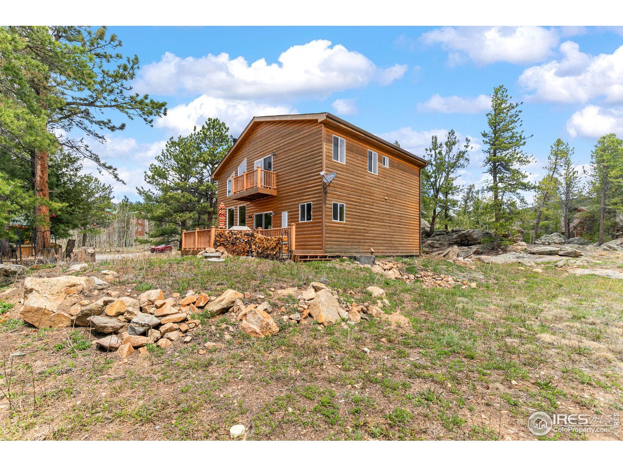 308 Pinon Circle Black Hawk, CO 80422 - Photo 26 of 37 a view of a house with a yard